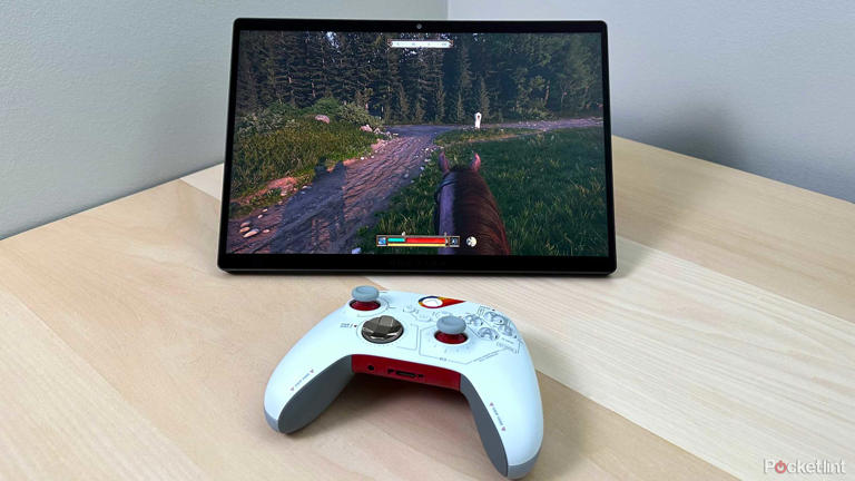 ROG Flow Z13 next to Xbox controller.