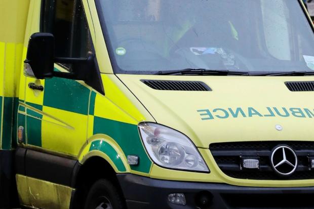 Car flips onto side in serious crash before driver rushed to hospital