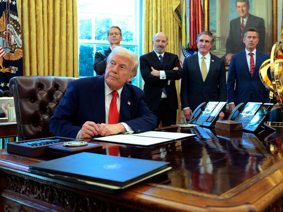 President Donald Trump prepares to sign executive orders in the Oval Office, April, 9, 2025 in Washington.