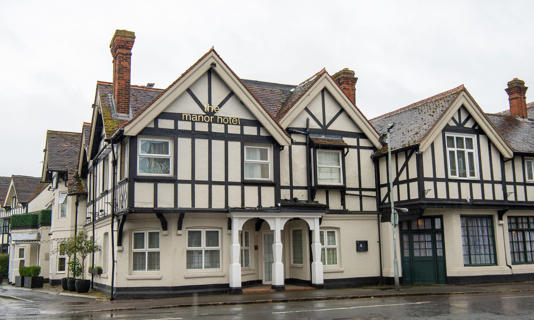 Asylum seekers are to be moved out of the Manor hotel in Datchet, Berkshire, which is near Windsor Castle. Photograph: Maureen McLean/Alamy