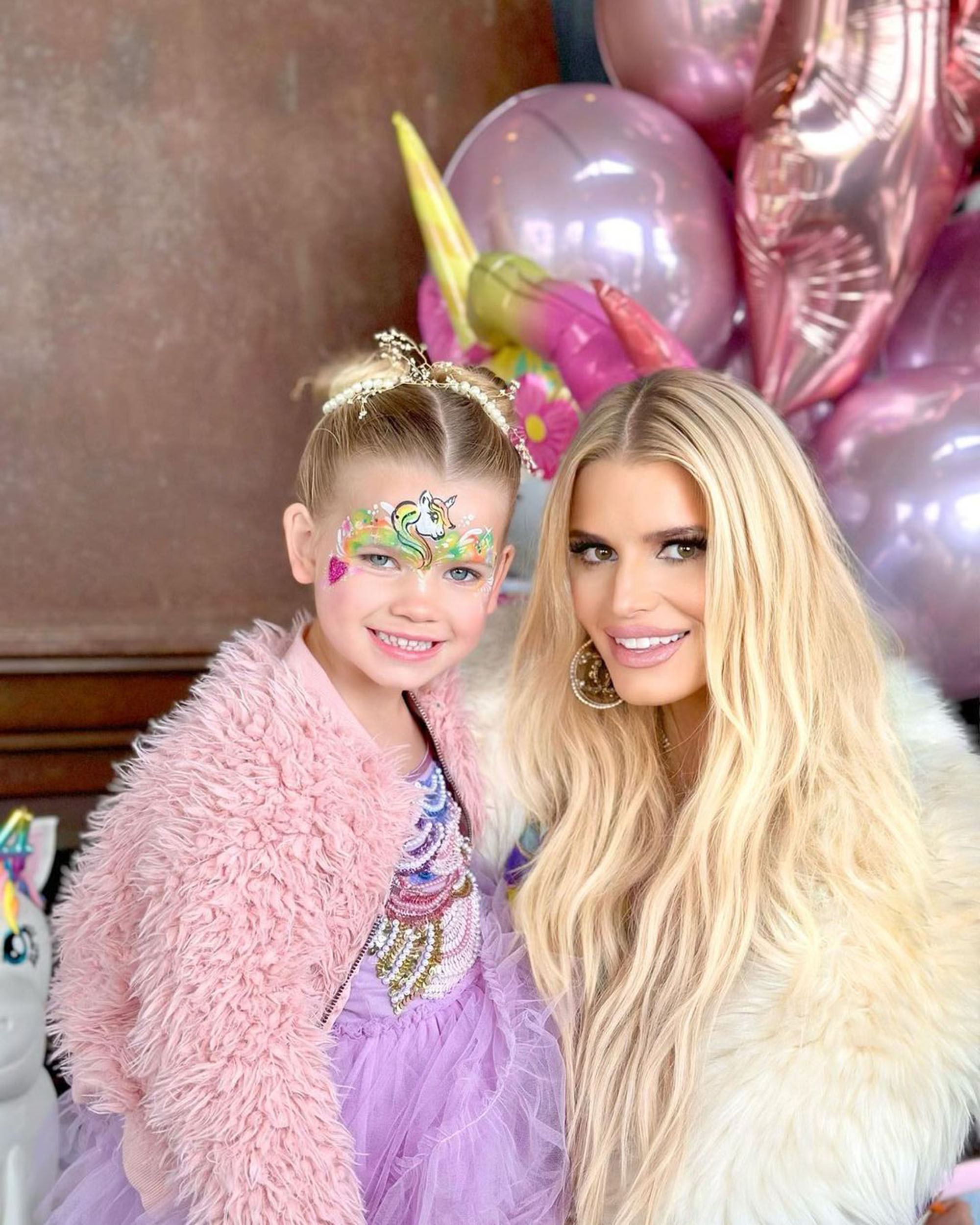 Jessica Simpson and daughter Birdie, 6, twin in yellow swimsuits ‘She