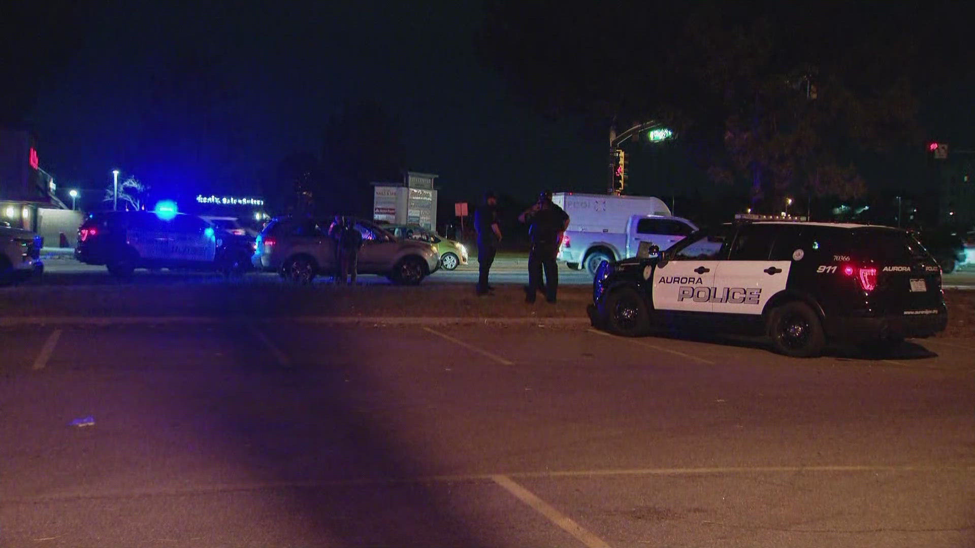 Man, woman shot while driving with children in Aurora