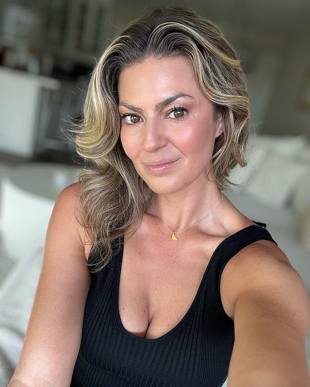 Rory McIlroy's rumoured ex Amanda Balionis reacts as she watches him