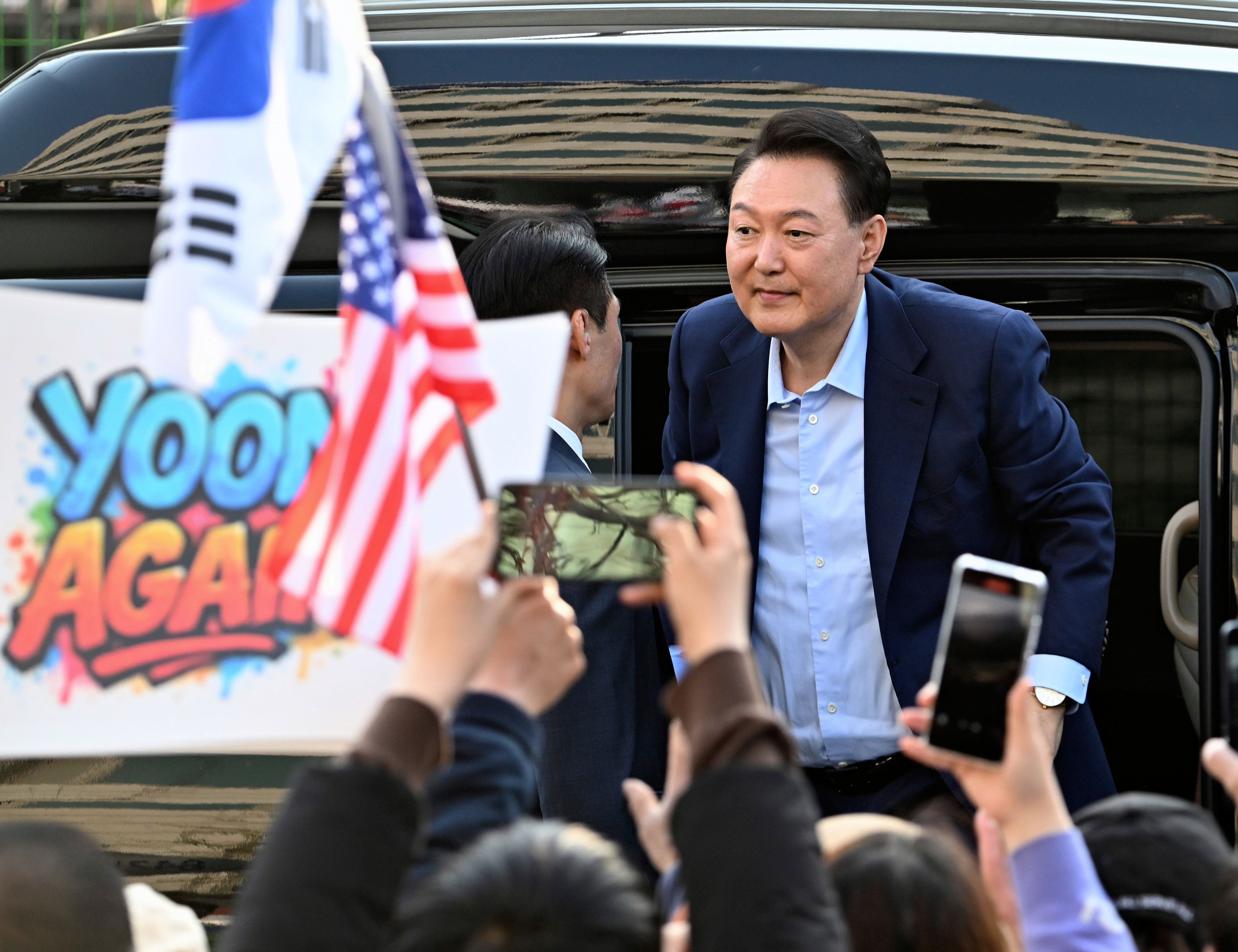 South Korea's ousted president Yoon Suk Yeol leaves his official residence in Seoul on 11 April 2025 (AP)