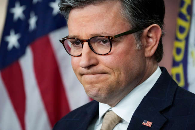 Mike Johnson at a press conference Mike Johnson at a press conference