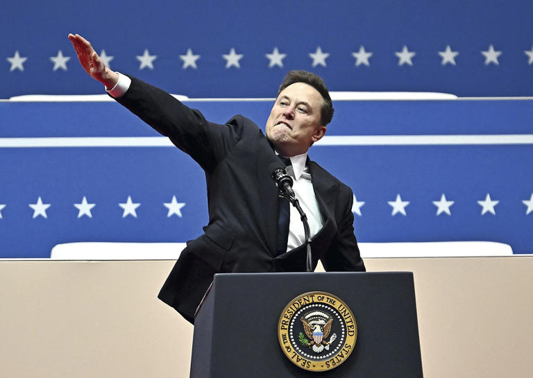 Elon Musk and his controversial arm gesture.