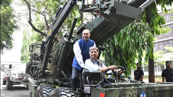 Baba Kalyani, CMD, Bharat Forge and Amit Kalyani with ATAGS (Advanced Towed Artillery Gun System) at Bharat Forge company at Mundhwa.
