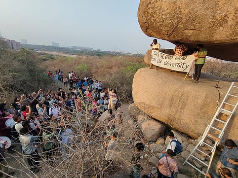 Students and staff of Hyderabad Central University protest at the Kancha Gachibowli forest site opposing the Telangana government's decision to develop the 400-acre land parcel.