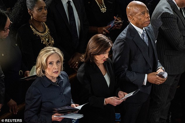 New York City Mayor Eric Adams (pictured alongside New York Governor Kathy Hochul and former Secretary of State Hillary Clinton) admitted he now believes in the 'deep state,' a so-called group of deep-cover individuals that truly run the US government, according to the conspiracy theory