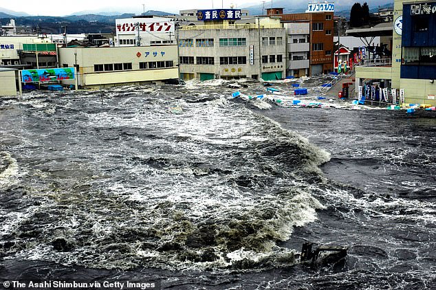 After a Nankai Trench megaquake, waves up to ten metres tall will hit Tokyo and 12 other prefectures along the southeast coast. Meanwhile, the cities of Kuroshio and Tosashimizu in Kochi Prefecture will be engulfed by a wave 34 metres (112ft) tall. Pictured: The first tsunami wave of the Tohoku earthquake washes over Kesennuma city 