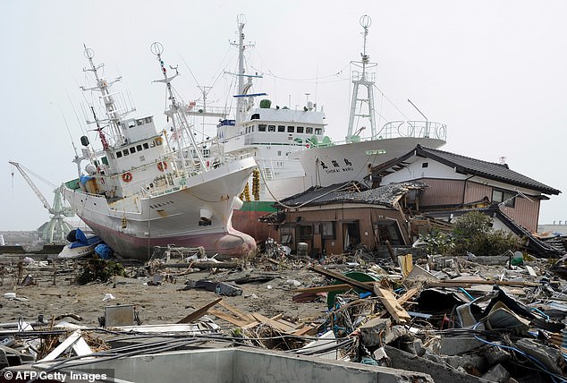 In 2011, a magnitude nine earthquake struck about 81 miles off the coast beneath the North Pacific. The earthquake produced waves up to 40 metres (132ft) tall in some places and killed 15,500 people. Pictured: Fishing boats washed up by the tsunami in Miyagi Prefecture&nbsp;