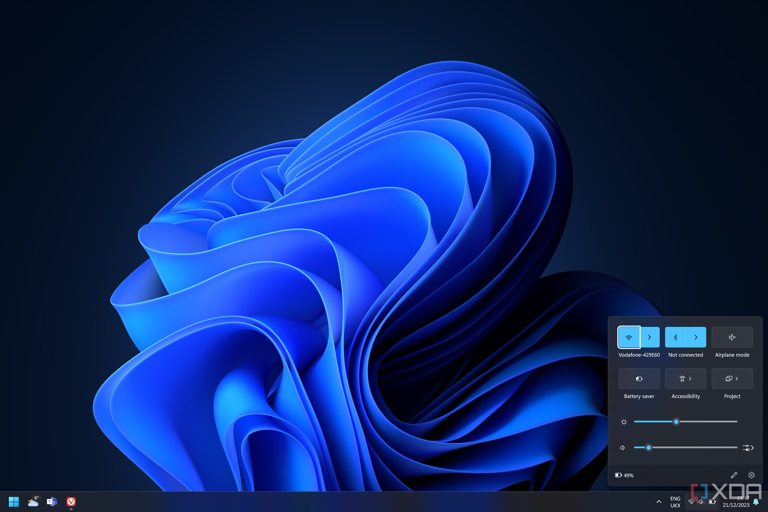 Screenshot of a Windows 11 desktop with the Quick Settings panel open