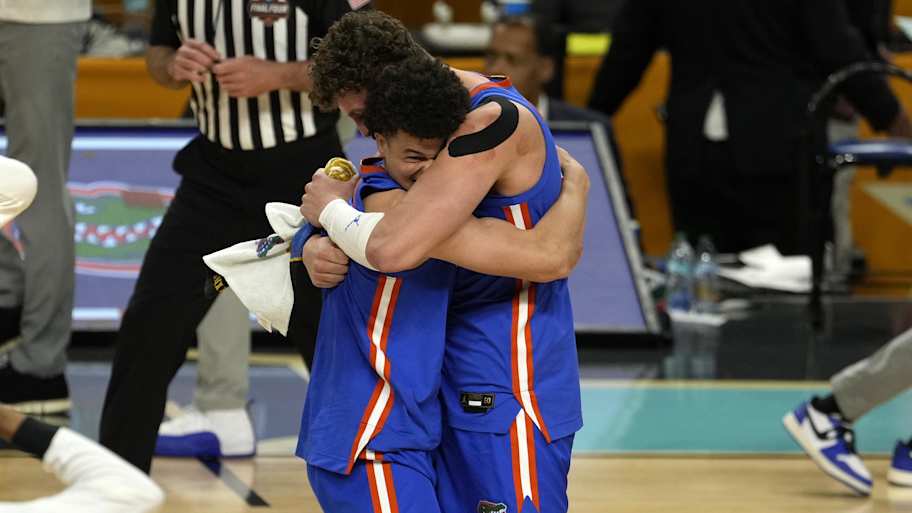 Walter Clayton Jr. consoles Houston player after Florida national