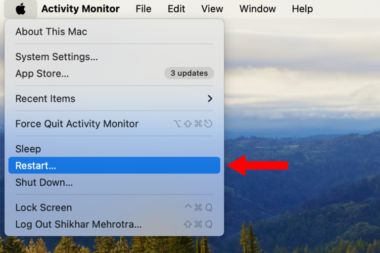 Screenshot of the Apple Menu with an arrow next to the Restart option.