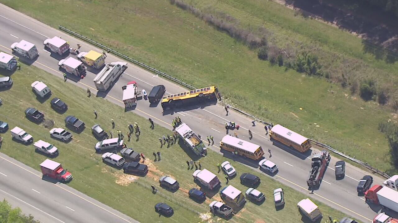 1 dead after school bus flips due to blown tire