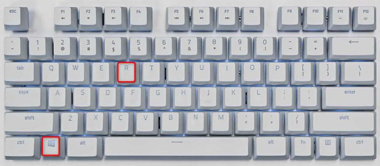 The Windows and R keys highlighted on a keyboard.