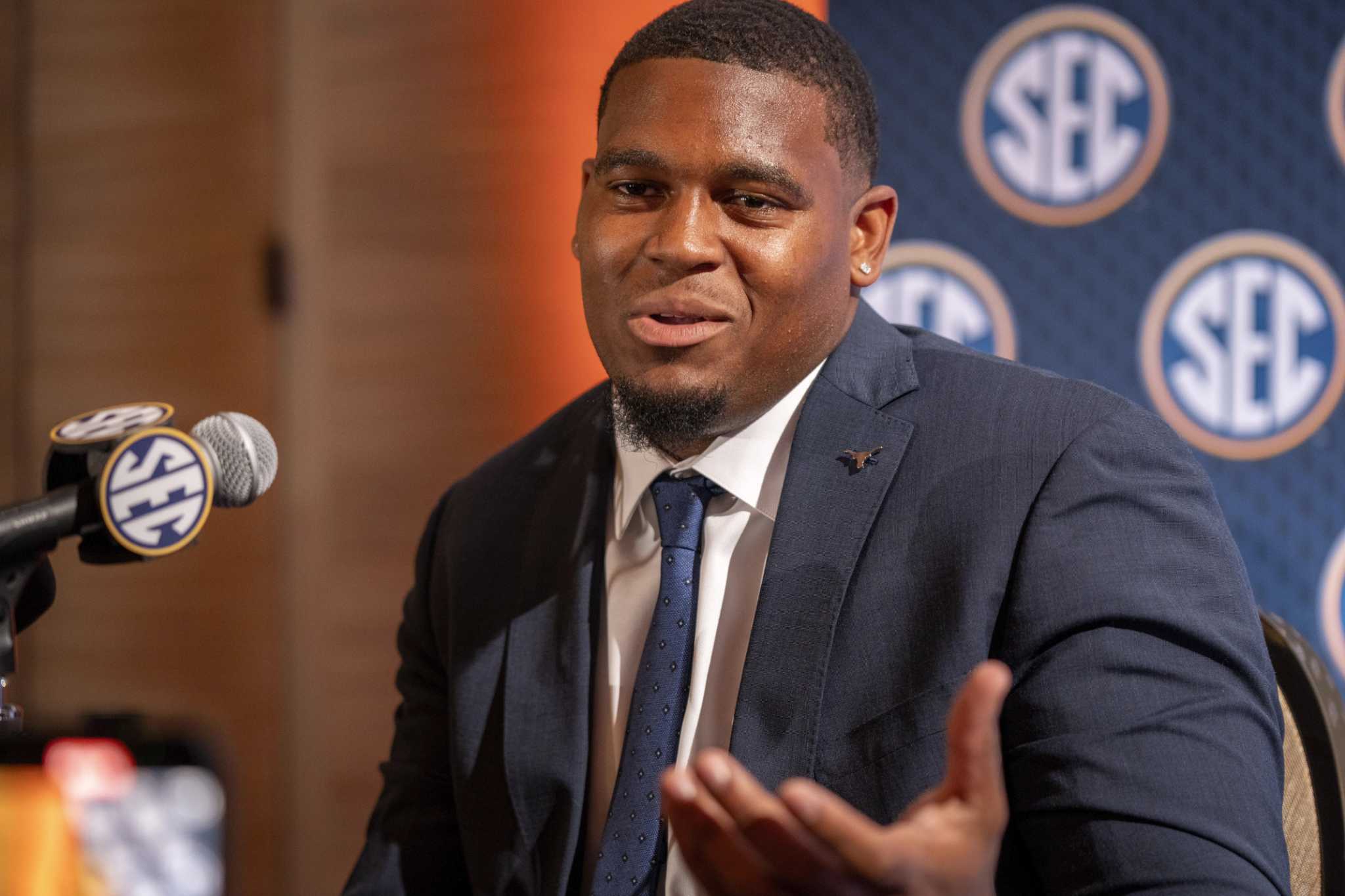 Texas' Kelvin Banks Jr.'s baby goes viral after spitting up on live TV