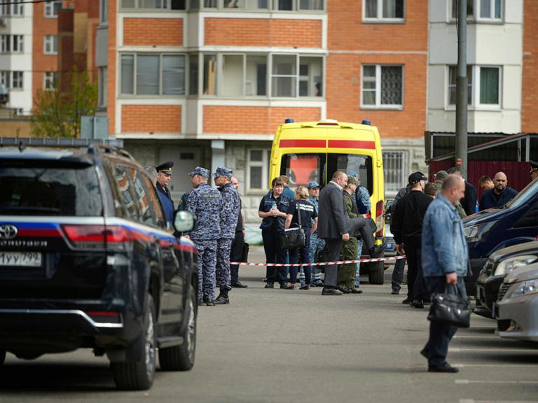 Police and investigators work at the scene where Lt. Gen. Yaroslav Moskalik was killed by an explosive device placed in his car in Balashikha, just outside Moscow, on April 25, 2025.