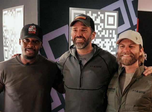 Donald Trump Jr., who is on the board of directors for and investor in PublicSquare, poses for a picture with PublicSquare CEO Michael Seifert and gun rights activist Colion Noir in January.