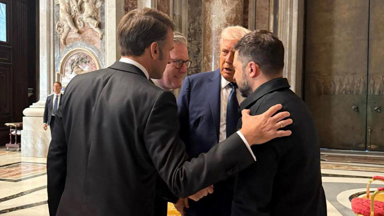 French President Emmanuel Macron and British Prime Minister Keir Starmer huddle with Trump and Zelensky in St. Peter's Basilica on Saturday ahead of the funeral. - Ukrainian Presidency