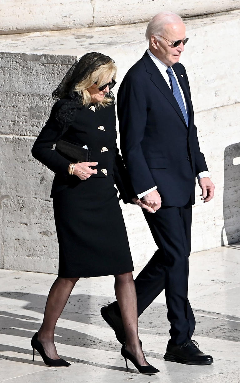 Dr Jill Biden wearing a mantilla-style black veil alongside her husband, former US president Joe Biden - Isabella Bonotto/AFP via Getty Images