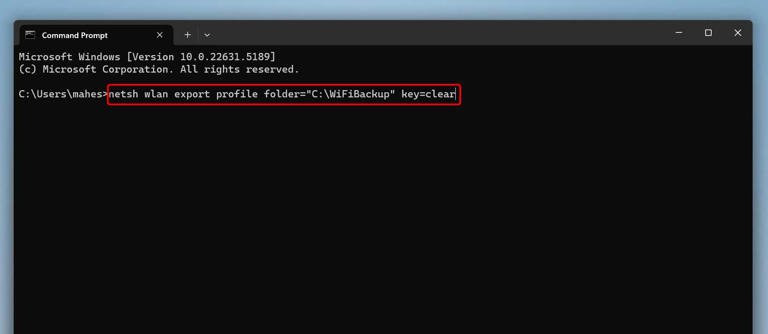 The command to export Wi-Fi networks typed in Command Prompt.