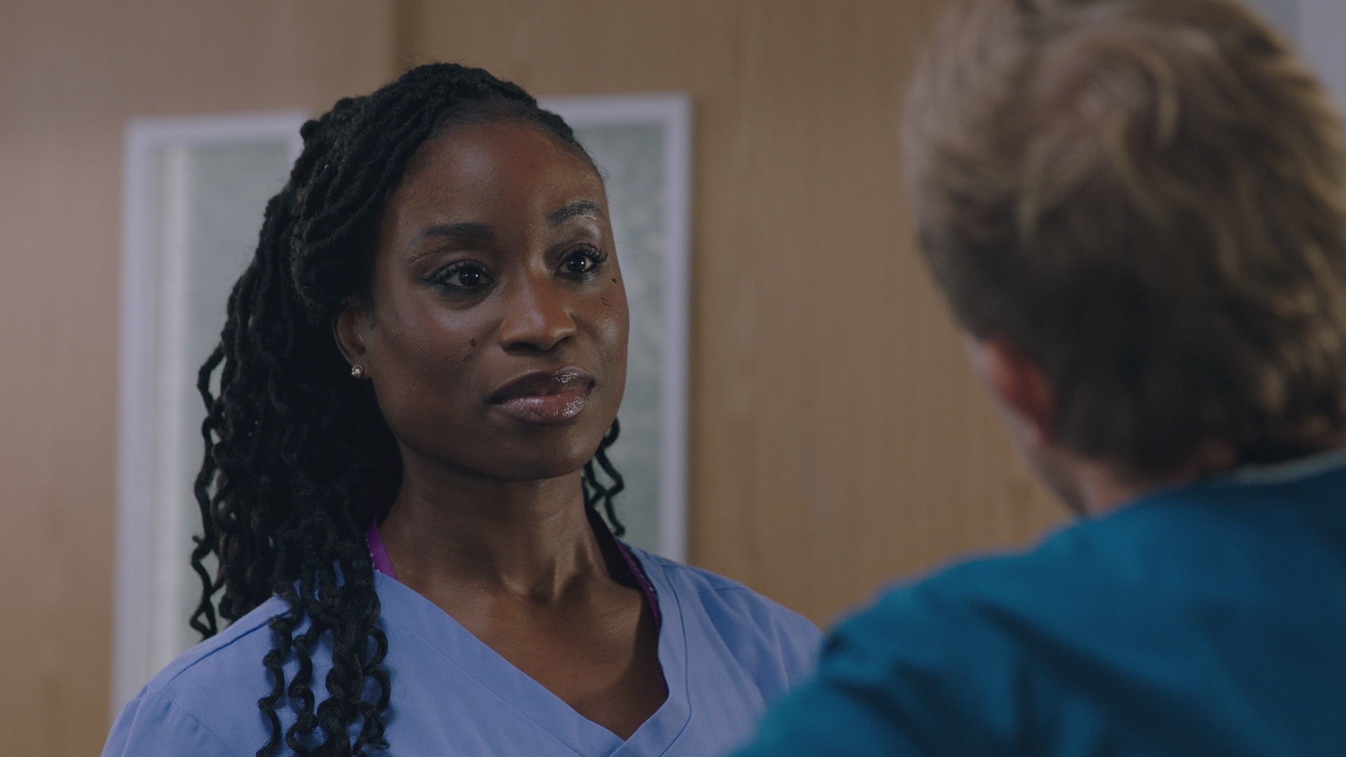 Ngozi holds back when she talks to Dylan. (Image credit: BBC Studios. )