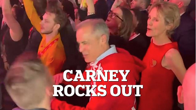 Moment Mark Carney and his wife rock out after election win