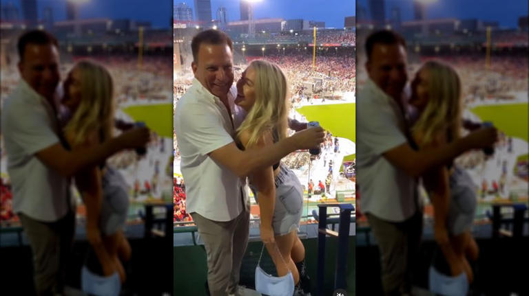 Karoline Leavitt laughing with her husband Nicholas Riccio.