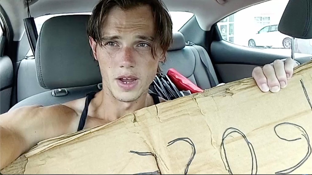 Proud heartthrob panhandler goes viral after rejecting calls for ...