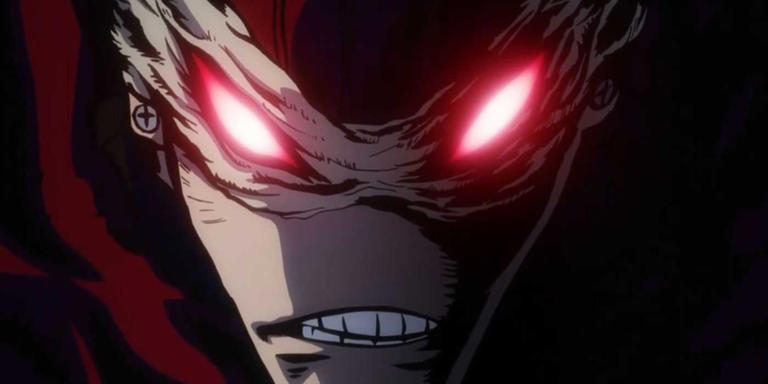 A close-up shot of Stain from My Hero Academia, as his eyes glow red.