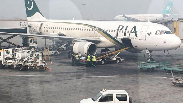 A Pakistan International Airlines (PIA) plane at Allama Iqbal International Airport in Lahore, Pakistan. REUTERS/Akhtar Soomro/File Photo