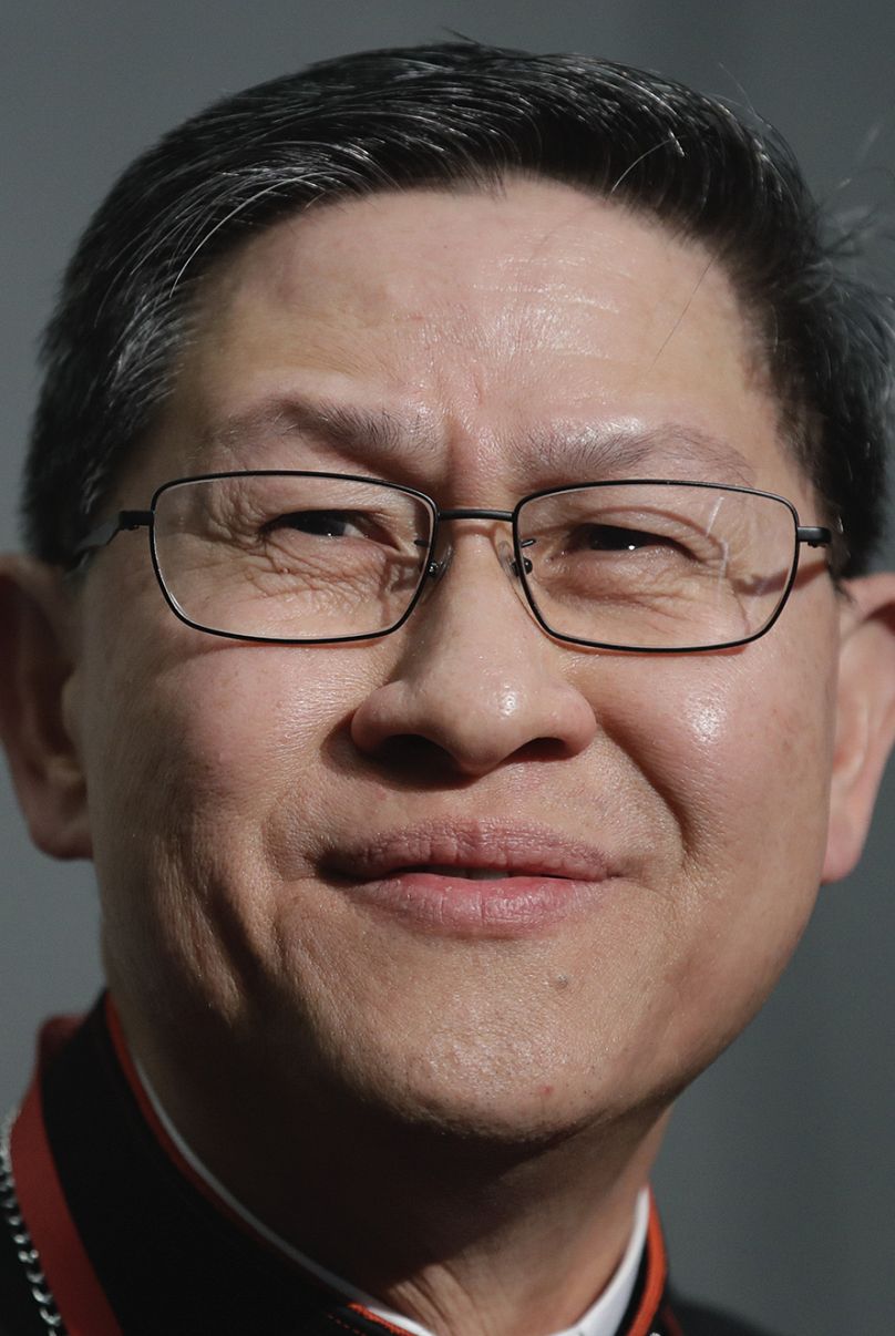 Cardinal Luis Antonio Tagle smiles during a news conference at the Vatican, 23 October, 2018 Alessandra Tarantino/Copyright 2018 The AP. All rights reserved
