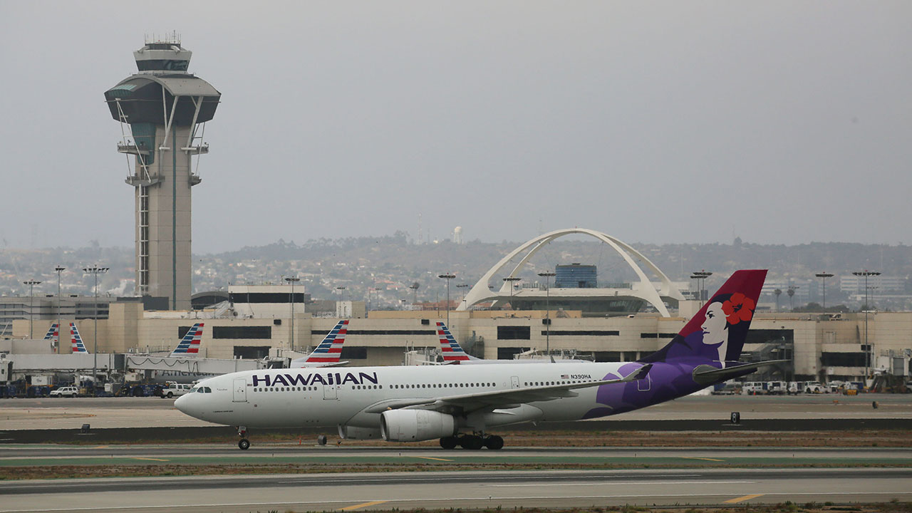 Hawaiian Airlines flight declares emergency after a mobile device gets