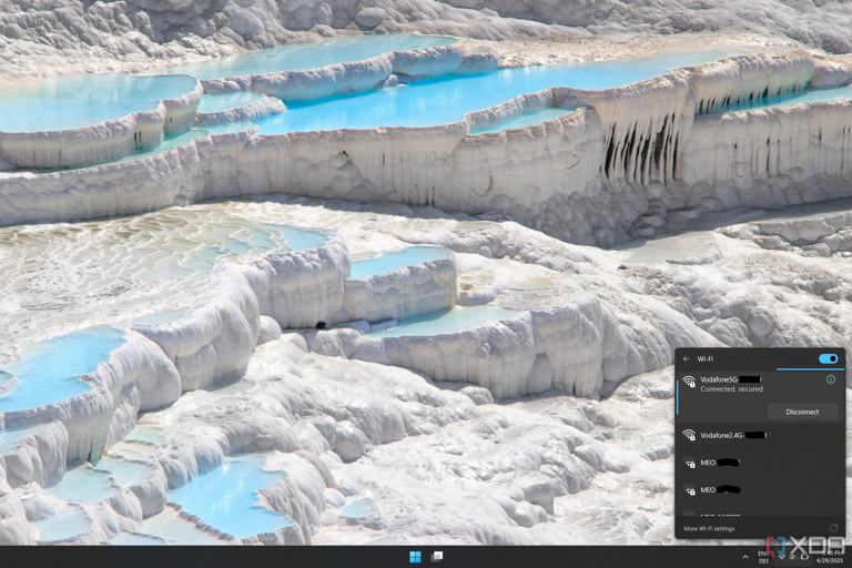 Screenshot of Windows 11 desktop showing a 2.4GHz and a 5GHz version of the same network
