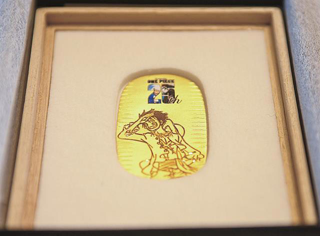 ワンピース」純金小判販売 アニメ放映開始25周年で コヅマヤ宝石で