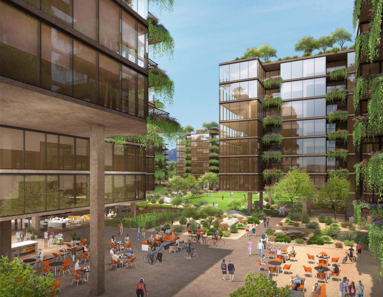 The buildings enclose a central greenspace