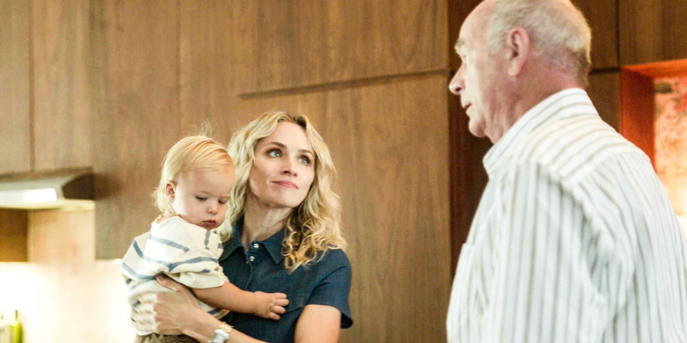 FBI Most Wanted Nina's father staring at her holding Dougie