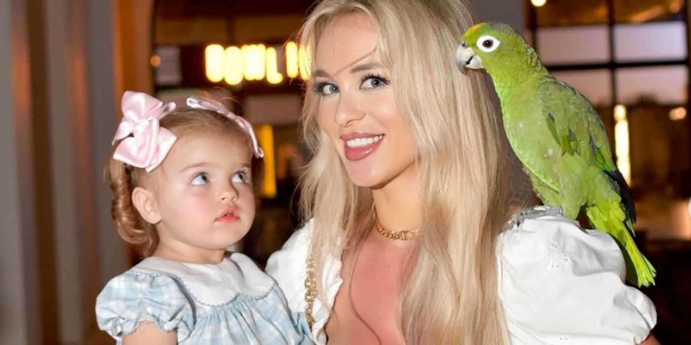 90 Day Fiancé Yara Zaya with a parrot on her shoulder and her daughter in her arms