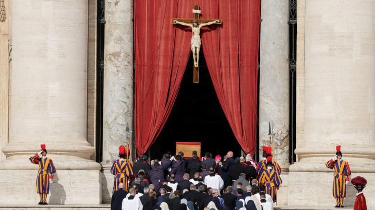 The coffin containing the body of Pope Francis is carried into St. Peter's Basilica. - Remo Casilli/Reuters