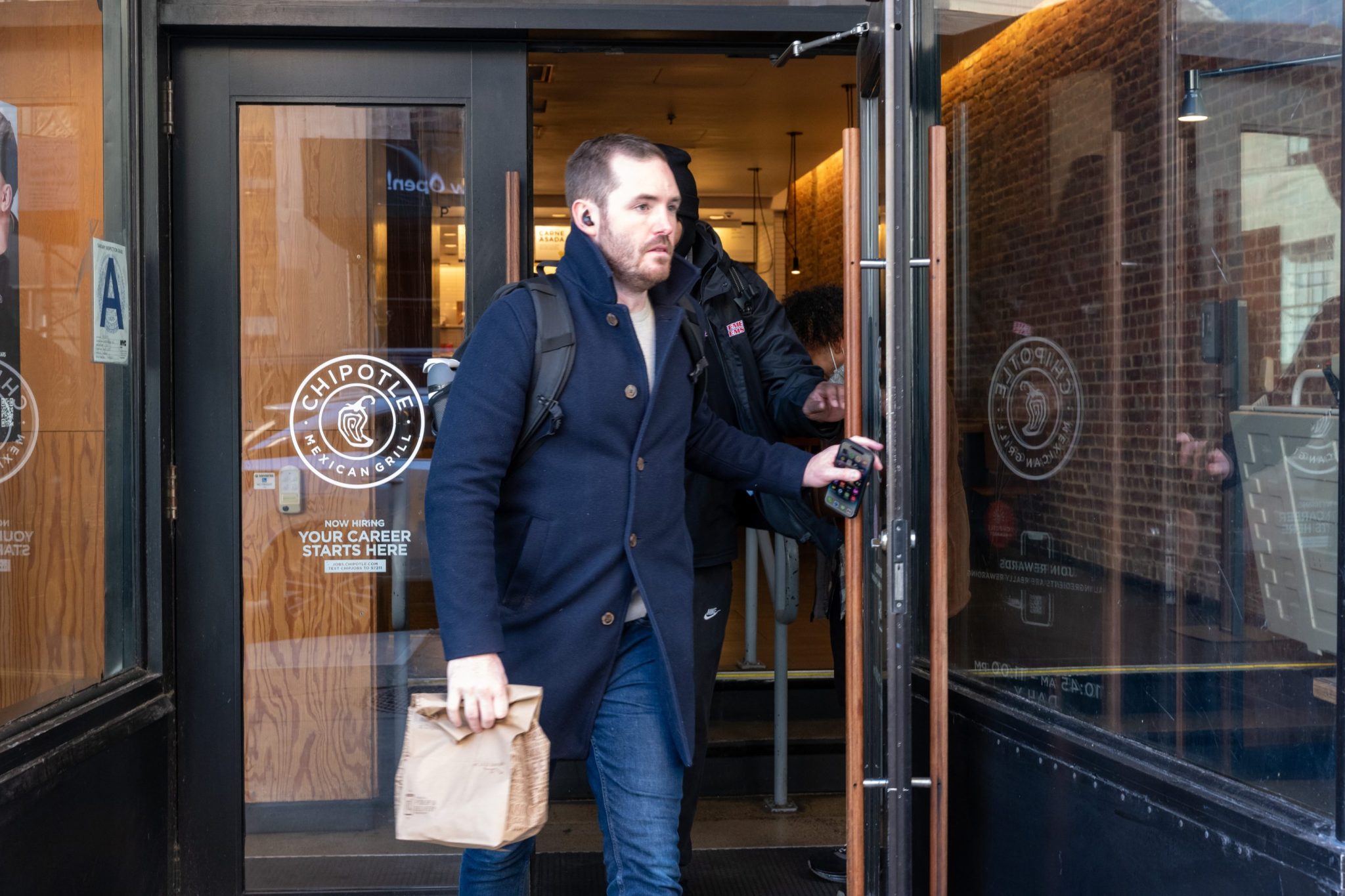 Chipotle CEO warns ‘the consumer is sitting on the sideline,’ leading ...