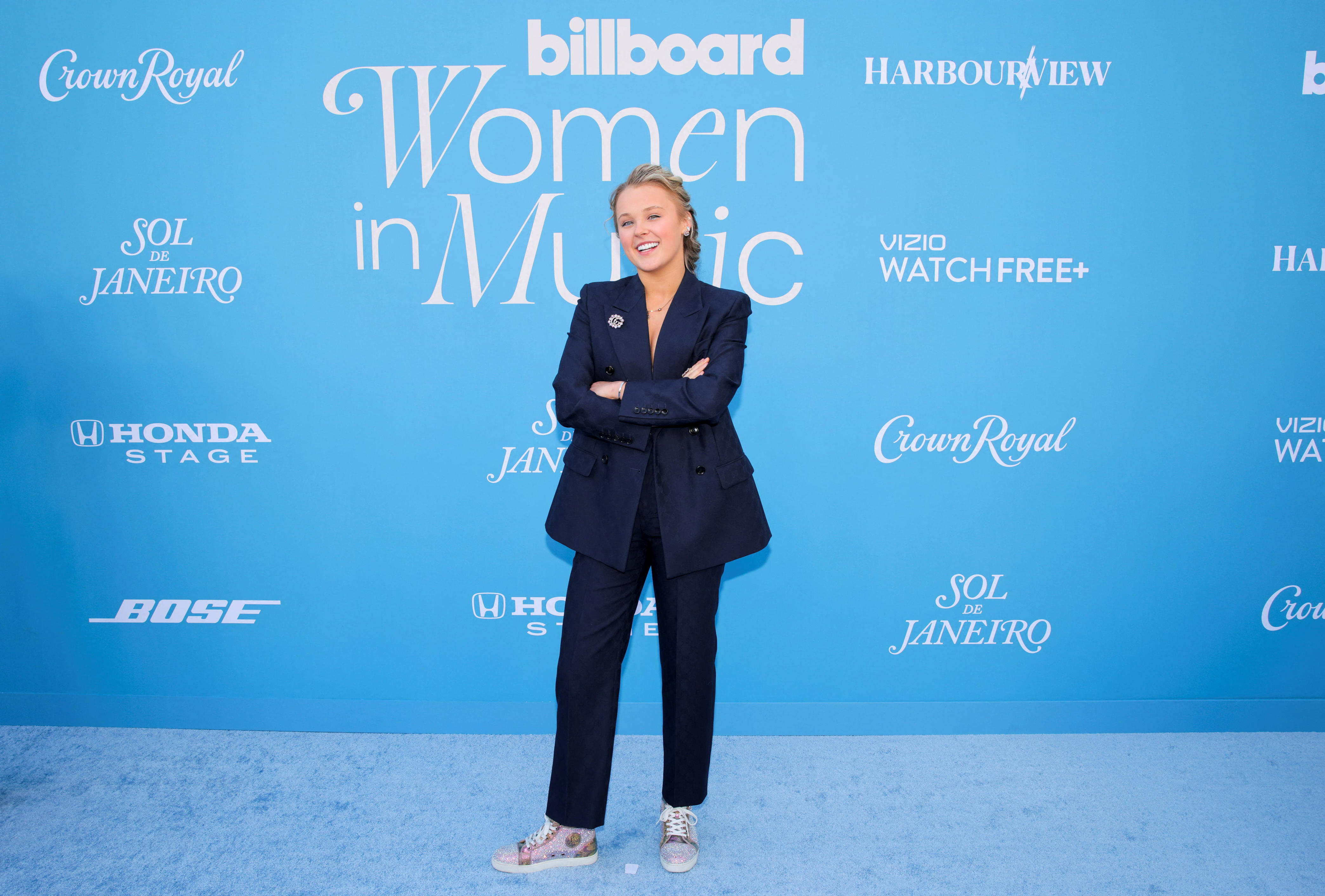 JoJo Siwa has continued to make headlines throughout her career since she first entered our screens in 2013. The Omaha, Nebraska, native, born Joelle Joanie Siwa, is famous for her giant hair bows, sparkly outfits, larger-than-life personality and being a champion for the LGBTQ+ community. The entertainment world first met Siwa in 2013, when she appeared as a contestant on "Dance Moms" spinoff "Abby's Ultimate Dance Competition" before landing a role as a "Dance Moms" series regular in 2015. In 2017, Nickelodeon signed Siwa to a talent deal, which led to 2018's animated series about her and her dog, "The JoJo and BowBow Show Show." She has also worked with Nick Cannon on "Lip Sync Battle Shorties" and leant her voice to last year's "Angry Birds" movie sequel. Today, you can watch her on "Celebrity Big Brother UK" or stream her latest EP, "Guilty Pleasure," released in 2024. See her career in photos.