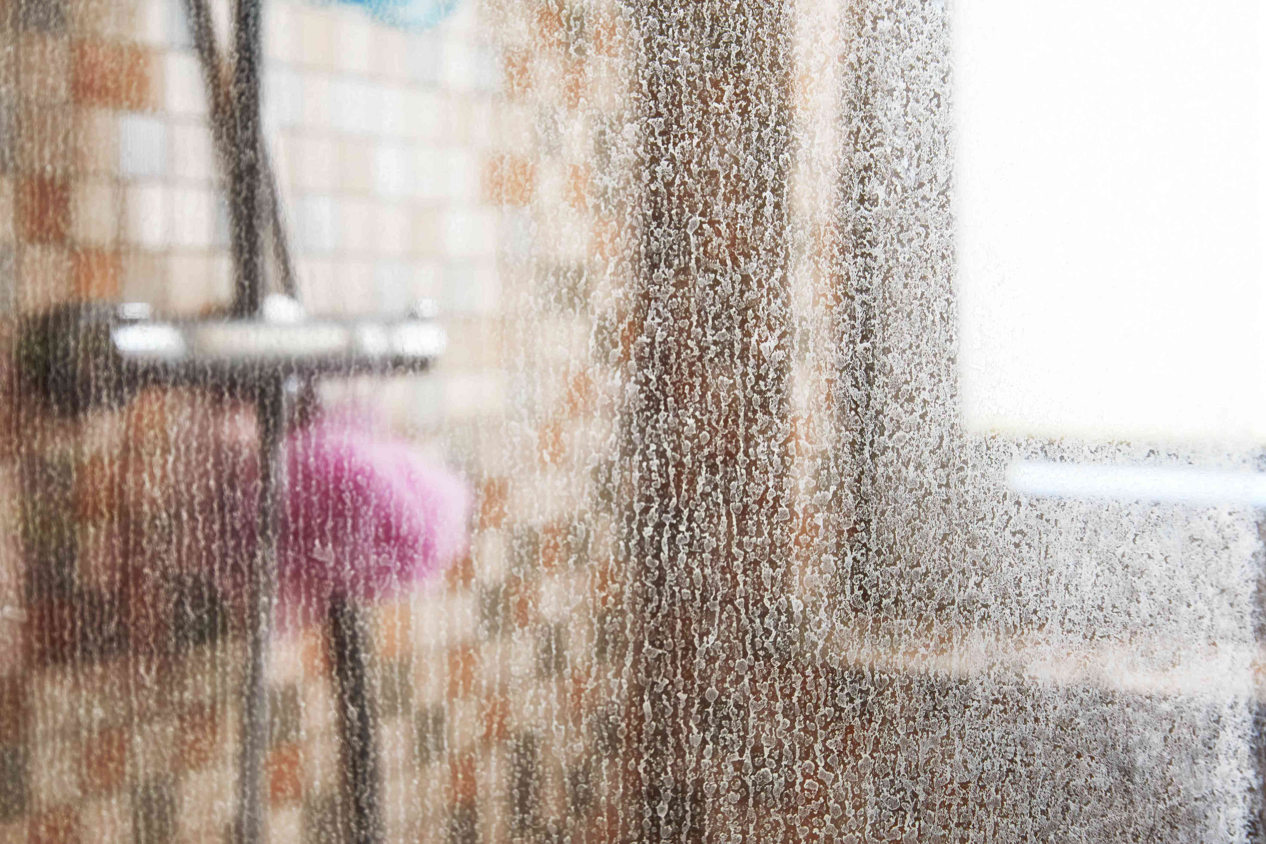 How To Clean Glass Shower Door To Remove Soap Scum And Hard Water Stains
