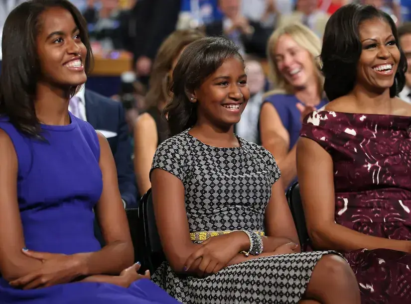 Malia & Sasha Obama Spotted In New Photo, As Mom Michelle Recalls