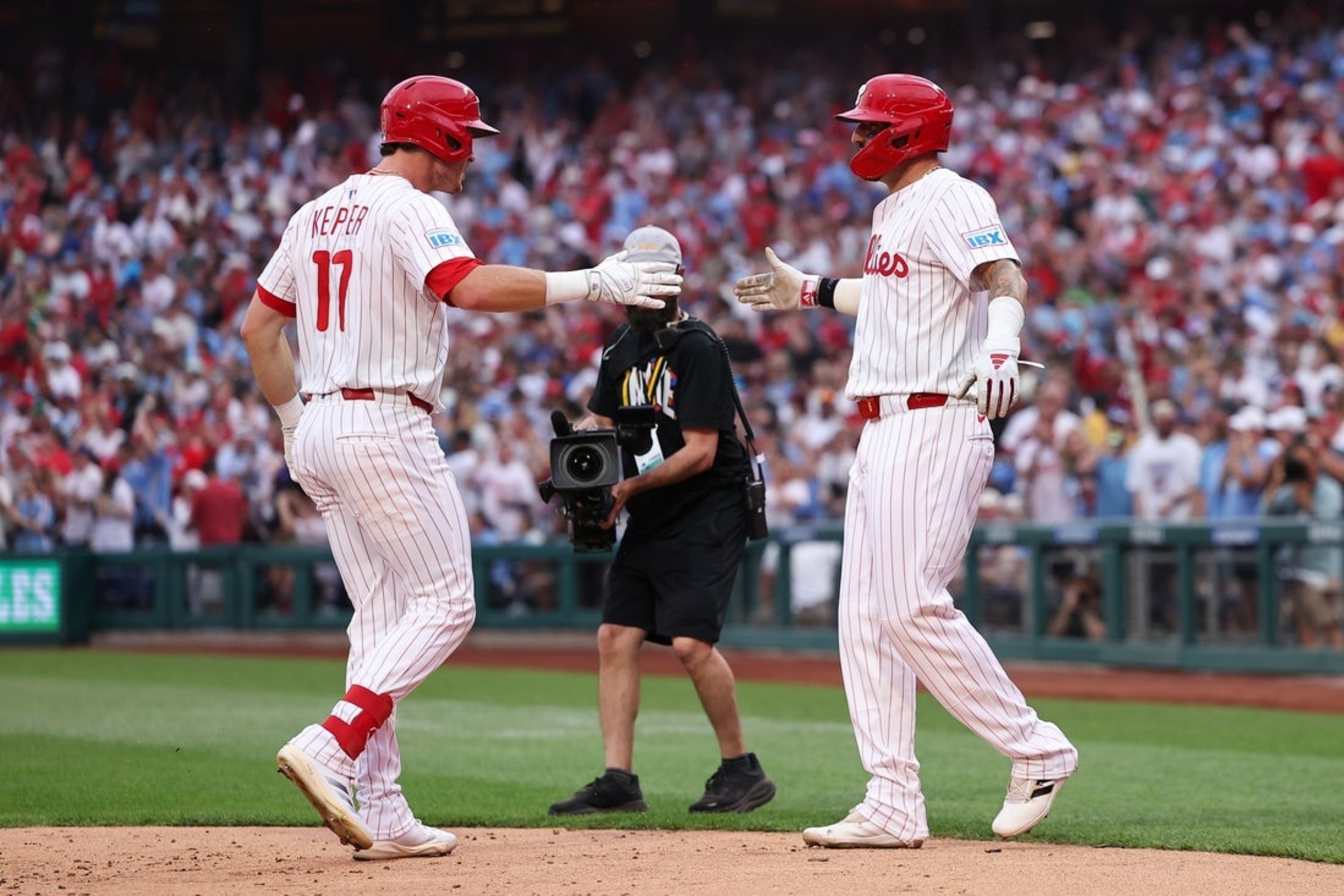 Aaron Nola wins first game of year, Phillies power past Diamonbacks 7-2