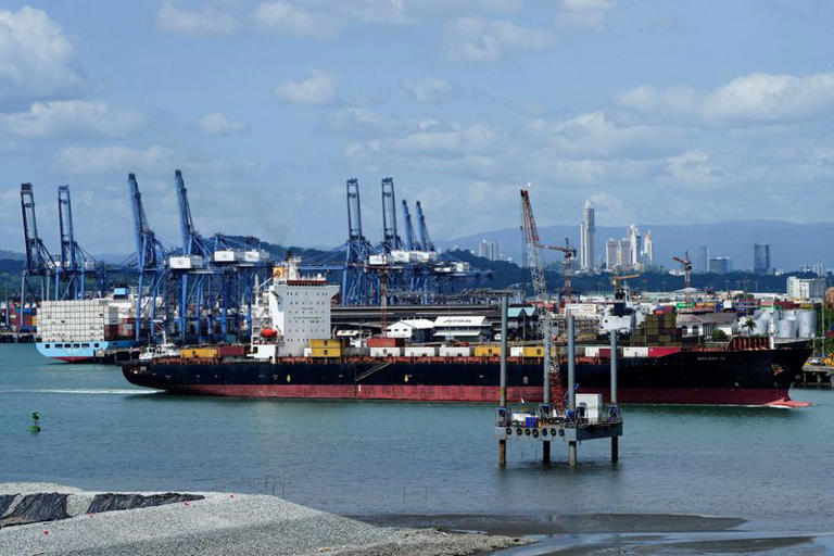 FILE PHOTO: A ship sails near the Balboa Port, Panama City, Panama, March 4, 2025. REUTERS/Enea Lebrun/File Photo