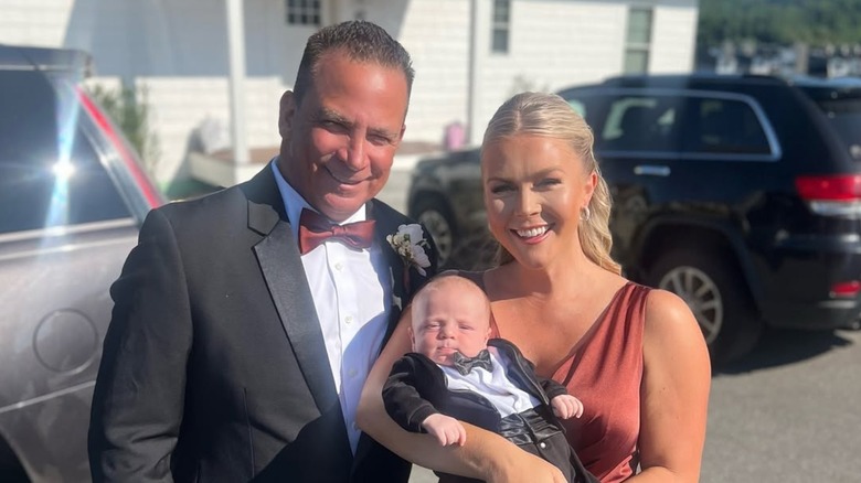 Karoline Leavitt posing with husband Nicholas and son Niko