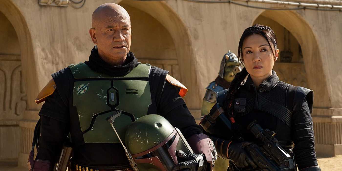 Fennec Shand stands with Boba Fett as they watch over Tatooine in The Book of Boba Fett