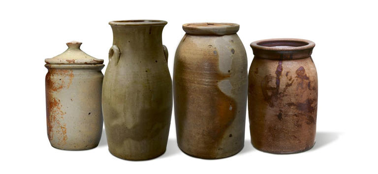 Pots created by the hands of Hiram Wilson and his colleagues have been passed down through households and sold at garage sales over the course of many generations Today their rich history as well as their distinctive styles and glazes make the jugs sought-after acquisitions for museum collections Left to right A preserve jar a three-gallon butter churn and a large jar with a lid from the Museum of Fine Arts Houston a stoneware jar from the Smithsonians National Museum of American History The Museum of Fine Arts Houston 3 NMAH