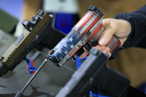 Texas bill would let voters bring guns to the polling station.